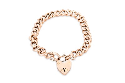 Lot 390 - A 9CT GOLD CURB LINK BRACELET, safety chain...
