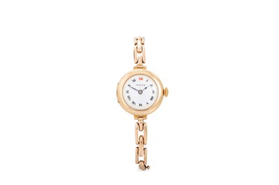 Lot 398 - AN ANTIQUE GOLD ROLEX LADY'S WATCH, expandable...