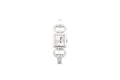 Lot 404 - A LADY'S GUCCI HORSE BIT WRISTWATCH, square dial