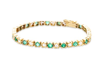 Lot 313 - AN EMERALD AND DIAMOND LINE BRACELET, mounted...