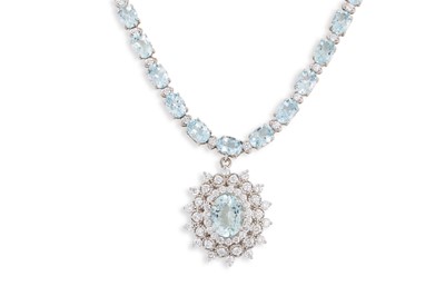 Lot 410 - AN AQUAMARINE AND DIAMOND NECKLACE, the round...