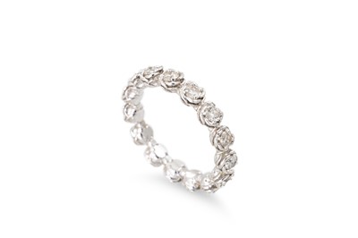 Lot 279 - A DIAMOND FULL BANDED ETERNITY RING, mounted...