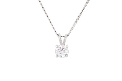 Lot 335 - A DIAMOND SOLITAIRE PENDANT, the brilliant cut...