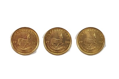 Lot 487 - THREE 0.1 OZ 1980 KRUGERRAND COINS, 22 ct....