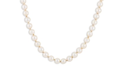 Lot 346 - A 1960S STRING OF CULTURED PEARLS, to a garnet...