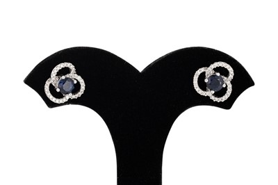 Lot 64 - A PAIR OF SAPPHIRE AND DIAMOND CLUSTER...