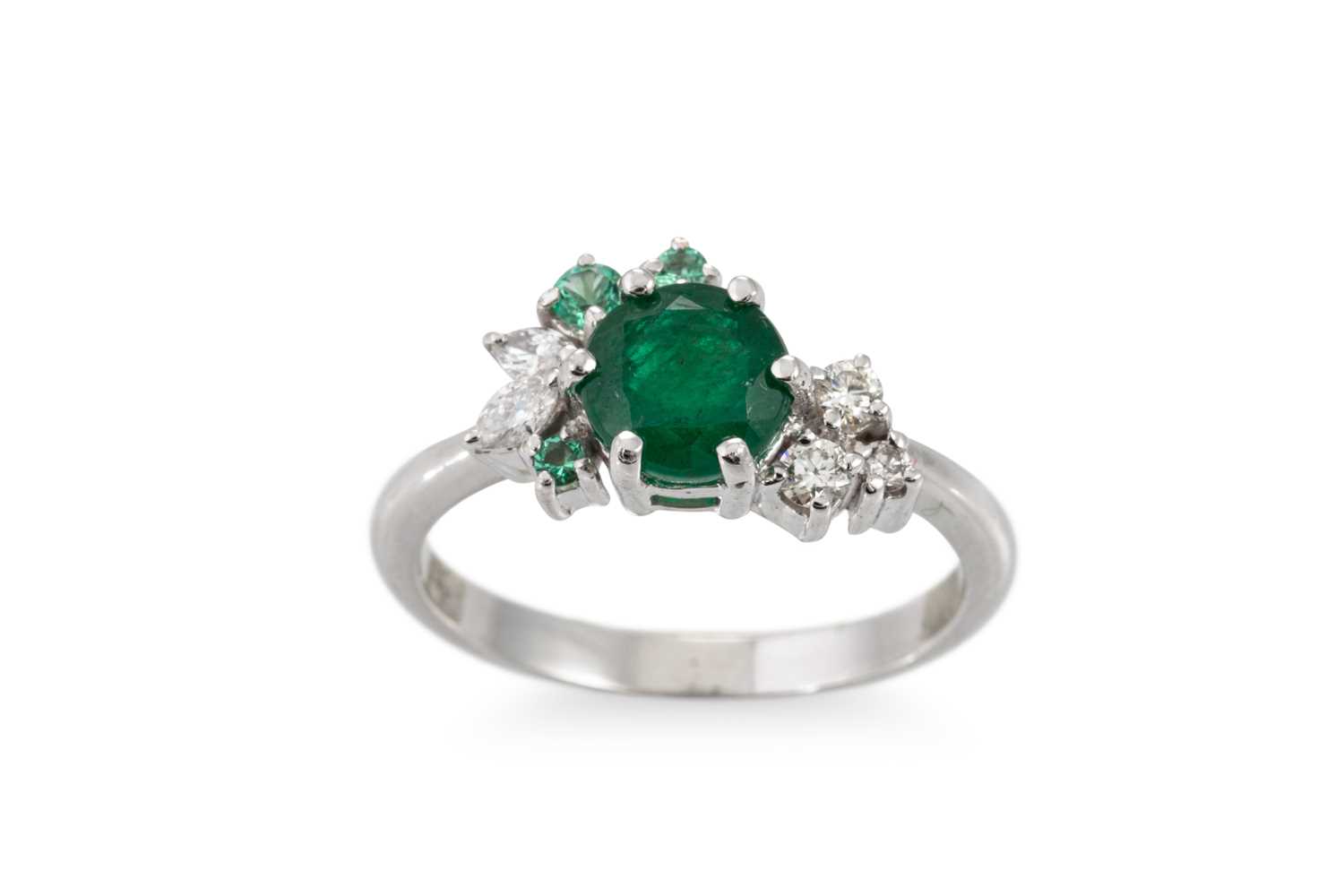 Lot 74 - AN EMERALD AND DIAMOND CLUSTER RING, mounted...