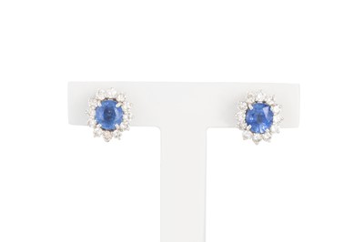 Lot 217 - A PAIR OF DIAMOND AND SAPPHIRE CLUSTER...