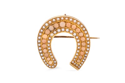 Lot 297 - A VICTORIAN CORAL AND SEED PEARL HORSESHOE...