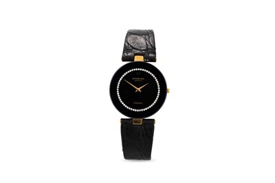 Lot 433 - AN ULTRA THIN RAYMOND WEIL WRISTWATCH, black...