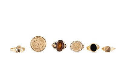 Lot 287 - SIX GOLD RINGS, to include topaz set, one...