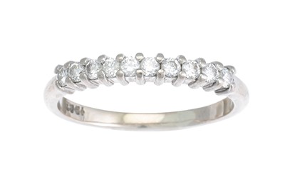 Lot 280 - A DIAMOND HALF HOOP ETERNITY RING, set with...