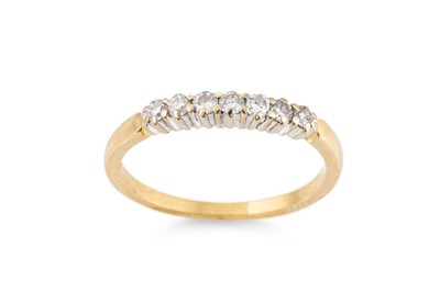 Lot 310 - A DIAMOND BAND RING, mounted in 18ct gold....