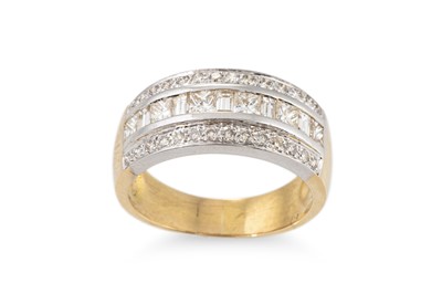 Lot 122 - A THREE ROWED DIAMOND RING, the princess,...
