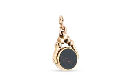 Lot 129 - A VINTAGE GOLD FOB SWIVEL PENDANT, set with...