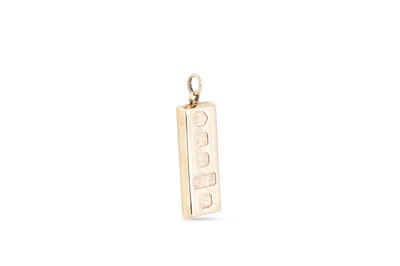 Lot 130 - A 9CT GOLD INGOT PENDANT, 28.9 g.