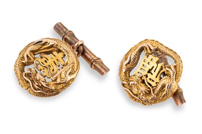 Lot 227 - A PAIR OF GOLD CUFFLINKS, with yellow metal...