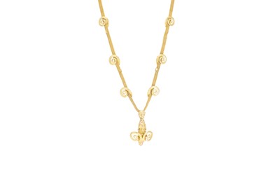 Lot 52 - AN GOLD PENDANT, modelled as a Ram's head,...