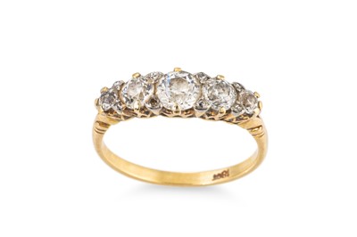 Lot 34 - A GRADUATED FIVE STONE DIAMOND RING, mounted...