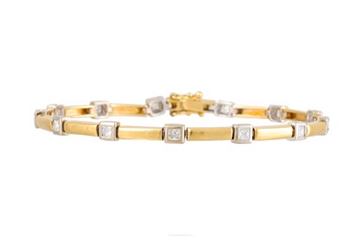 Lot 322 - A DIAMOND BRACELET, collet set with thirteen...