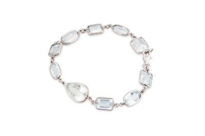Lot 143 - AN AQUAMARINE BRACELET, the vari-cut stones...