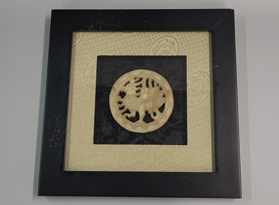Lot 239 - A SET OF FOUR CARVED WHITE JADE, framed