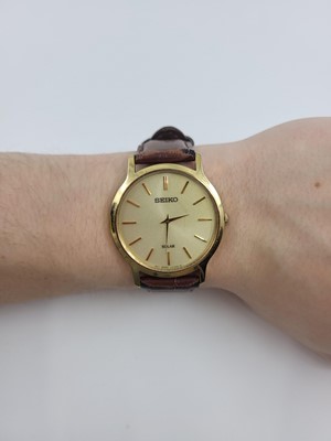 Lot 380 - A GENT'S 14CT GOLD GLYCINE “SPECTRUM” QUARTZ...