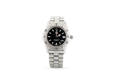 Lot 390 - A TAG HEUER WRISTWATCH, black dial with date,...