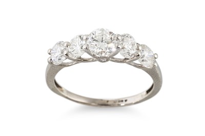 Lot 283 - A GRADUATED DIAMOND FIVE STONE RING, the round...