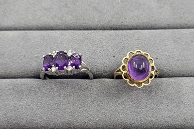 Lot 8 - TWO AMETHYST SET RINGS, mounted in 9 ct white...