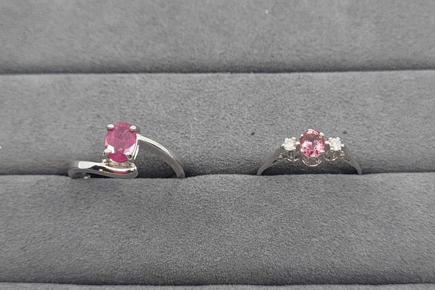 Lot 28 - TWO GEMSTONE RINGS, gemstone and diamond set...