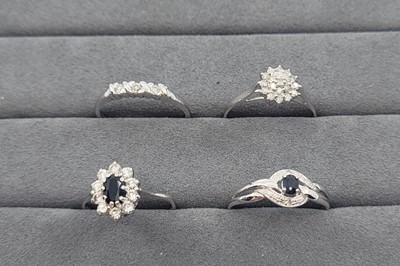 Lot 27 - TWO DIAMOND SET CLUSTER RINGS, together with...
