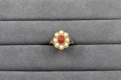Lot 73 - A CULTURED PEARL AND CORAL SET CLUSTER RING,...
