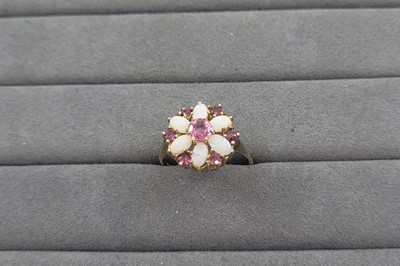 Lot 81 - AN OPAL AND GEMSTONE CLUSTER RING, the oval...