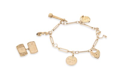 Lot 205 - A 9CT GOLD CHARM BRACELET, with various charms...