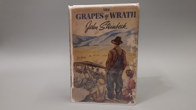 Lot 193 - A COPY OF ‘THE GRAPES OF WRATH’ by John...