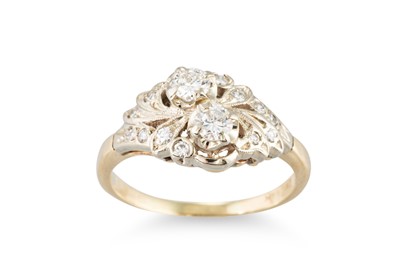Lot 224 - A DIAMOND CLUSTER RING, set with two principal...