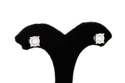 Lot 173 - A PAIR OF DIAMOND STUD EARRINGS, illusion set...