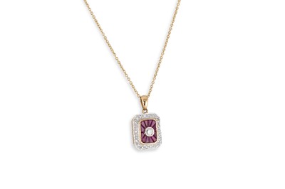 Lot 293 - A RUBY AND DIAMOND CLUSTER PENDANT, mounted in...