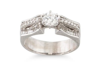 Lot 298 - A DIAMOND RING, the brilliant cut diamonds to...