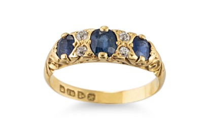 Lot 300 - A VINTAGE SAPPHIRE AND DIAMOND RING, mounted...