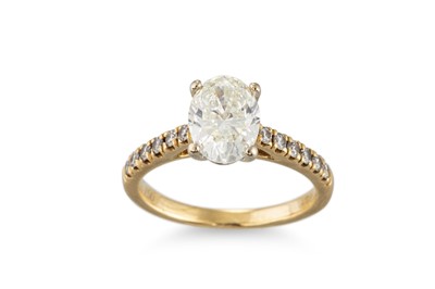 Lot 360 - AN OVAL DIAMOND SOLITAIRE RING, with a diamond...