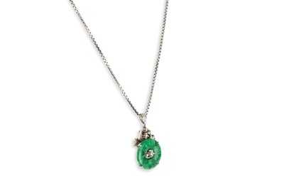 Lot 323 - A JADE AND DIAMOND PENDANT, comprising a jade...