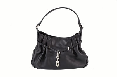 Lot 570 - A TOD'S BLACK LEATHER SHOULDER BAG, with white...