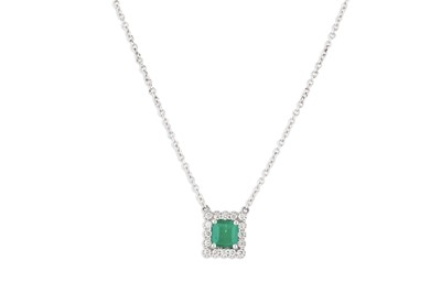 Lot 156 - AN EMERALD AND DIAMOND CLUSTER PENDANT, of...