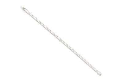Lot 289 - A DIAMOND LINE BRACELET, the brilliant cut...