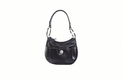 Lot 571 - A TOD'S MINI BLACK LEATHER HAND BAG, with...