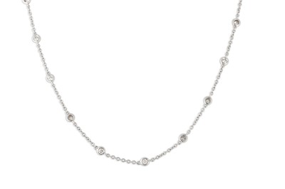 Lot 336 - A DIAMOND SET NECKLACE, the collet set...