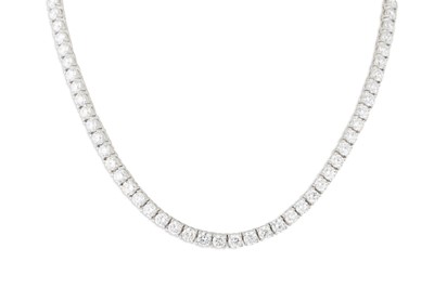 Lot 342 - A DIAMOND LINE NECKLACE, set with brilliant...