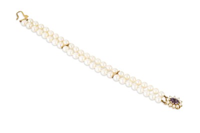 Lot 12 - A DOUBLE ROW CULTURED PEARL BRACELET, with...